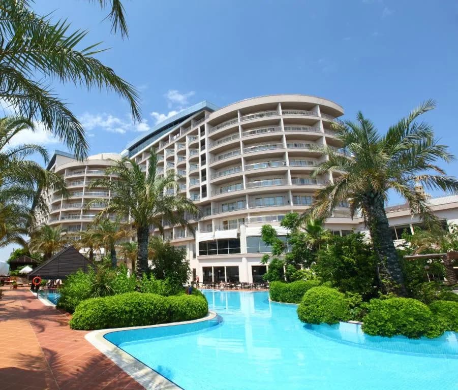 Main pool and resort facade at Liberty Hotels Lara, Lara Beach Antalya