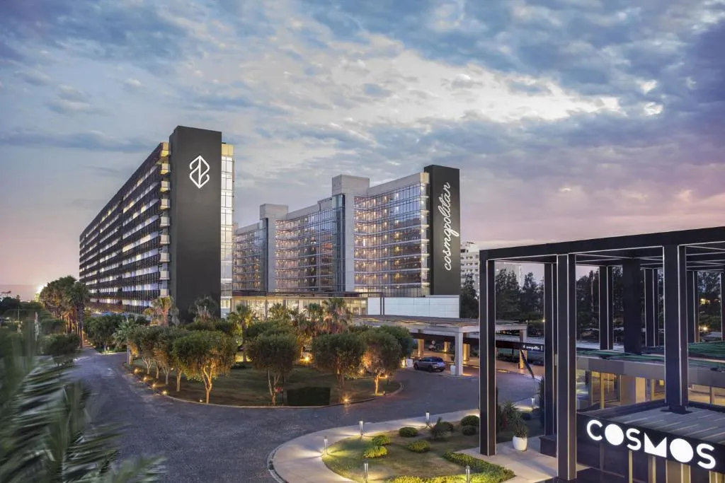 Main pool and resort facade at Nirvana Cosmopolitan Hotel, Lara Beach Antalya