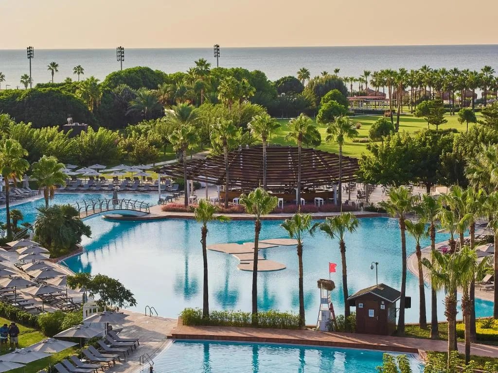 Main pool and resort facade at Lara Barut Collection, Lara Beach Antalya