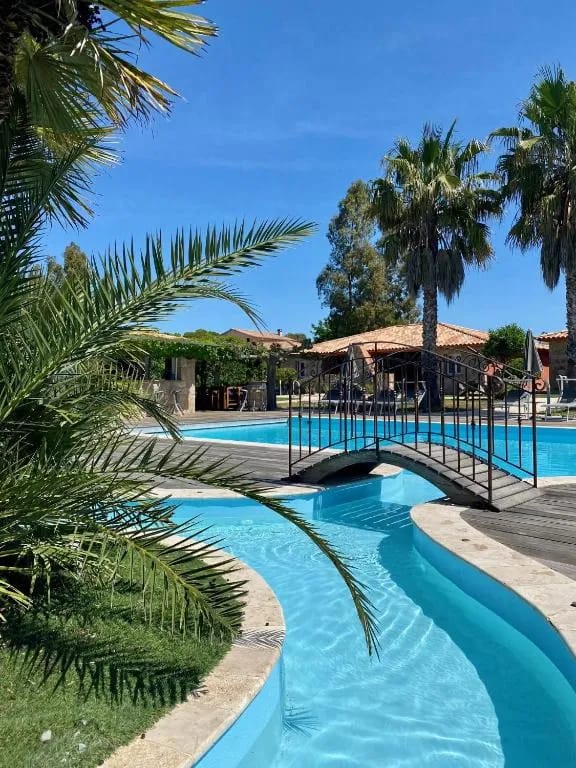Hôtel Dolce Vita exterior with pool and garden in Ajaccio, Corsica