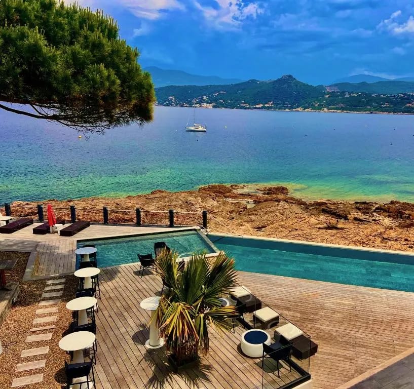 Pool at Hôtel Castel d'Orcino overlooking Baie de la Liscia