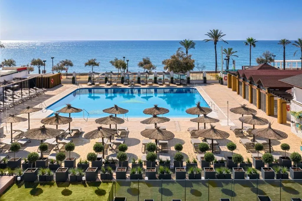 Occidental Fuengirola hotel facade and pool, beachfront
