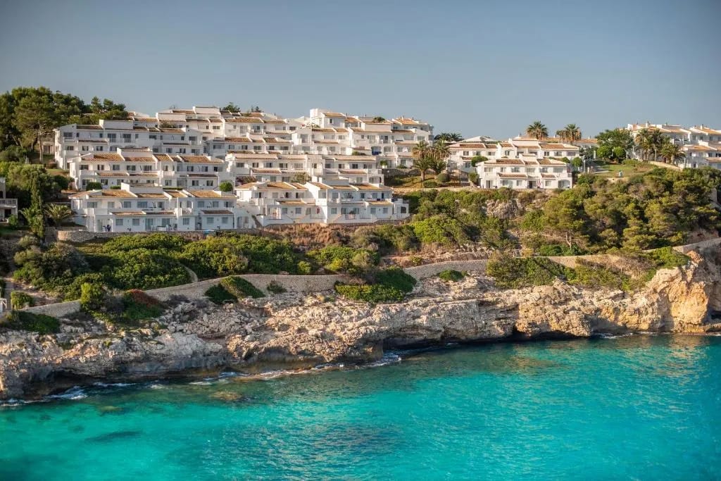 Blau Punta Reina resort pool and beachfront, Cala Mendia