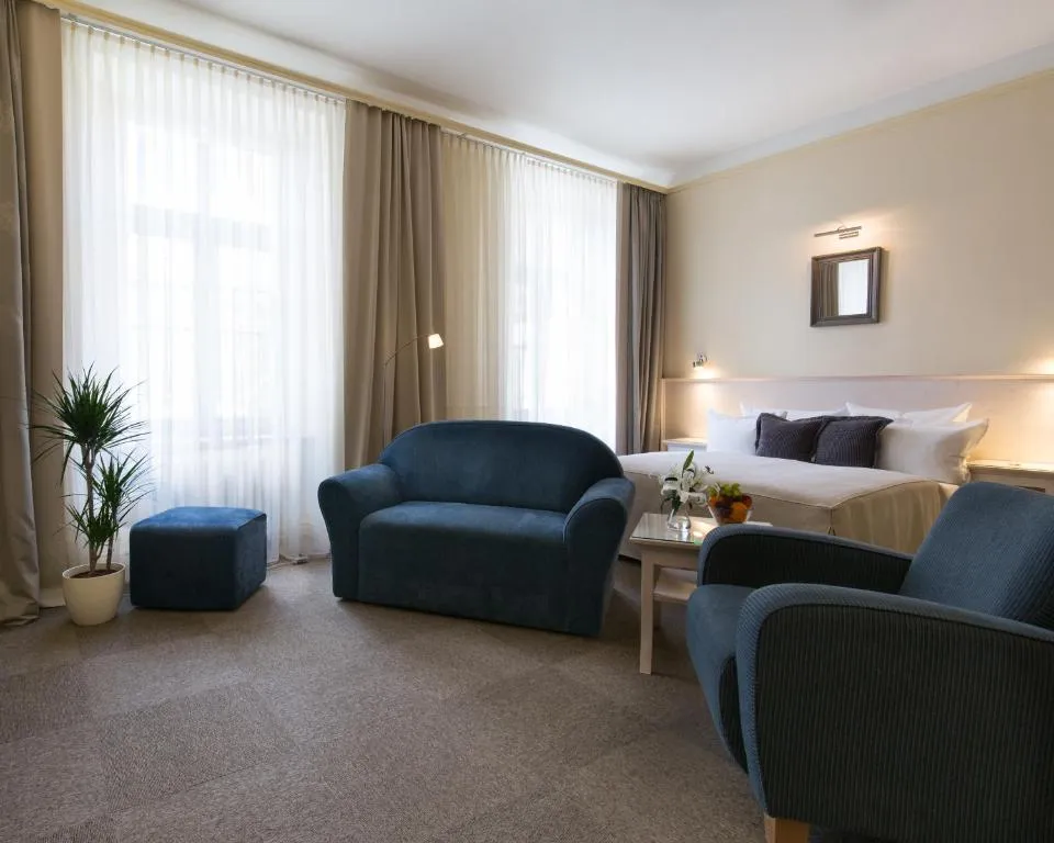 Facade of Unitas Hotel, family hotel with play area in Prague
