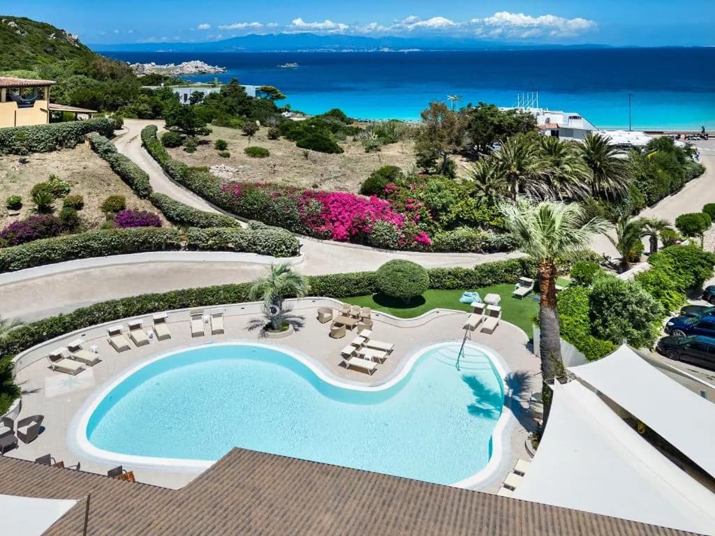 Hotel Corallaro facade and pool area in Santa Teresa Gallura, Sardinia